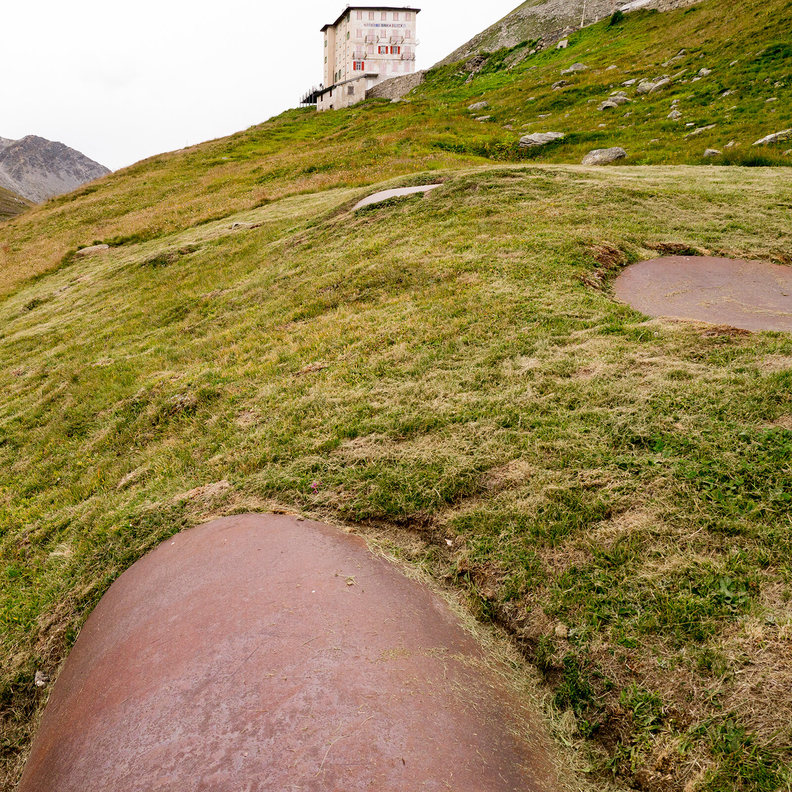 Three rolled conic surfaces applied to a region of curvature maintaining local and somatic descriptions