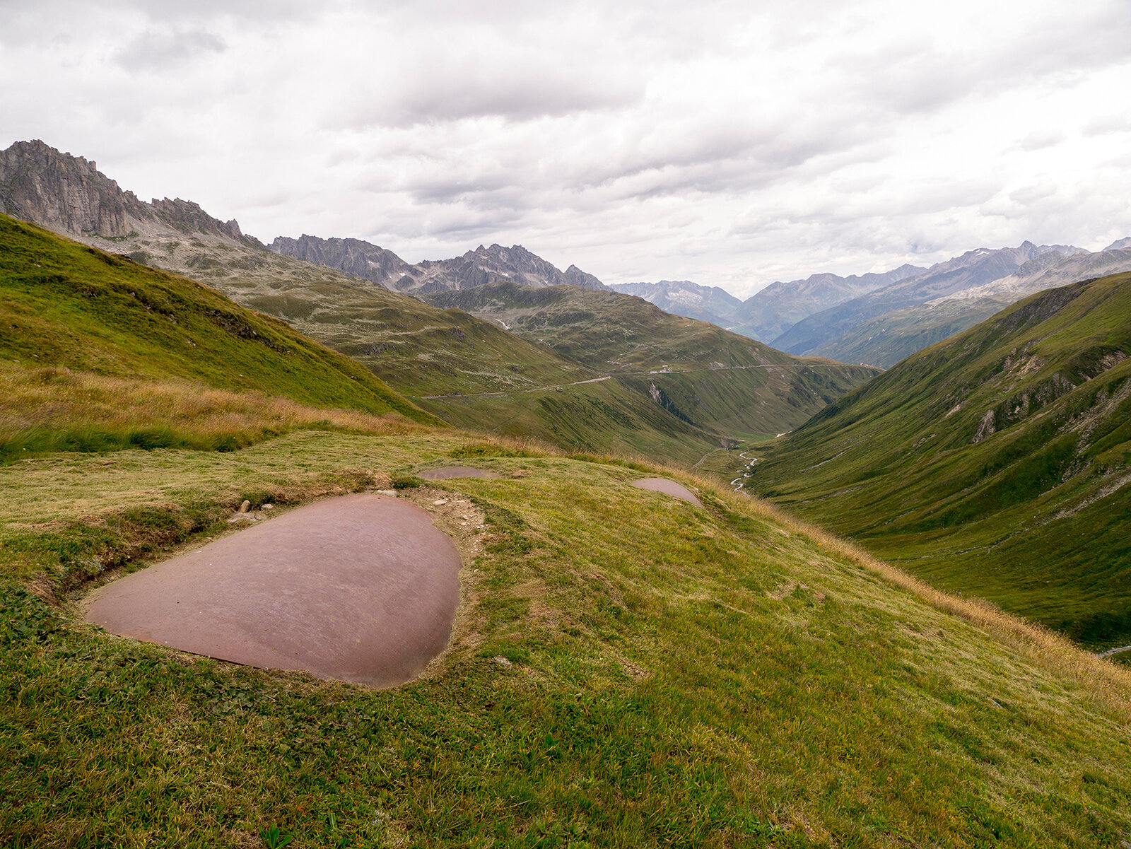 Three rolled conic surfaces applied to a region of curvature maintaining local and somatic descriptions